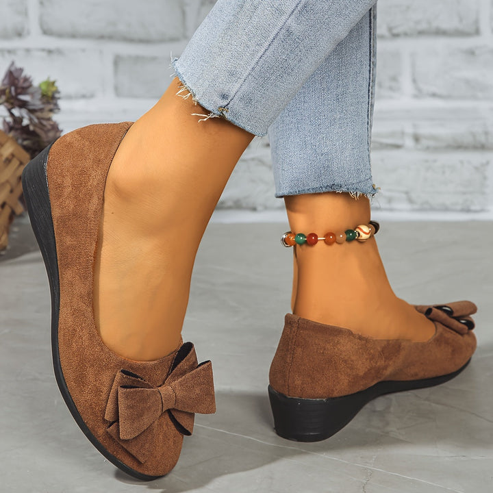 Classic black wedge ballet flats for women, versatile slip-on shoes with chic bow, comfy everyday.