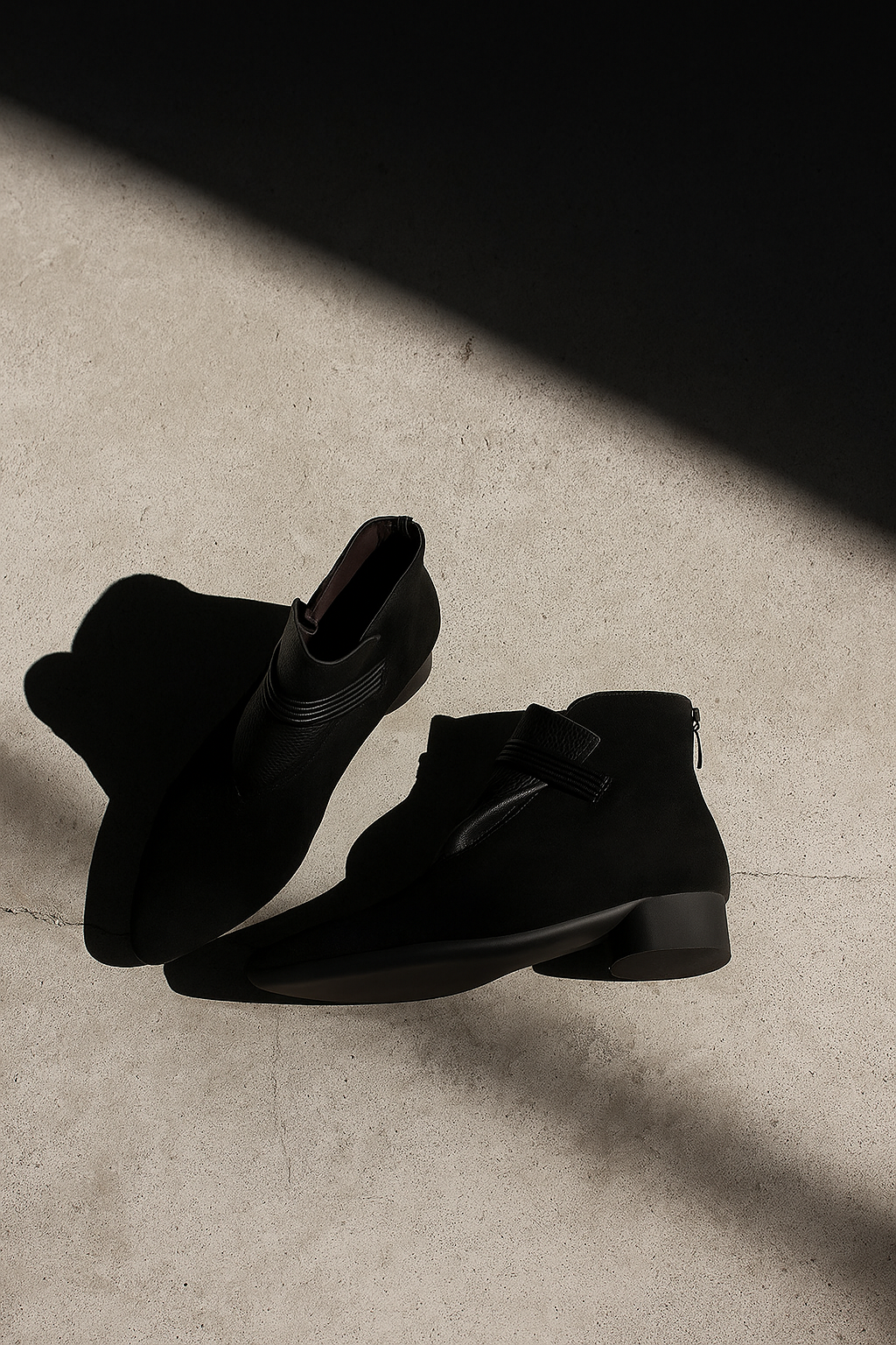 Versatile women's everyday low heel ankle booties, comfortable and stylish in classic black.