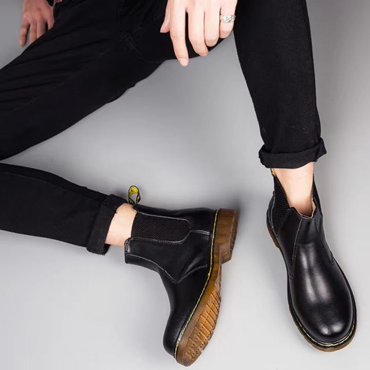 Modern unisex ankle Chelsea boots, ideal slip-on footwear for a comfortable and versatile everyday style.