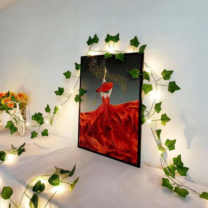 Elegant LED leaf vine lights, warm white glow, perfect for festive party decor & daily ambiance.