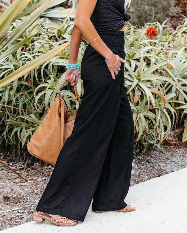 Versatile women's linen wide leg trousers, perfect for stylish casual or elegant summer looks.