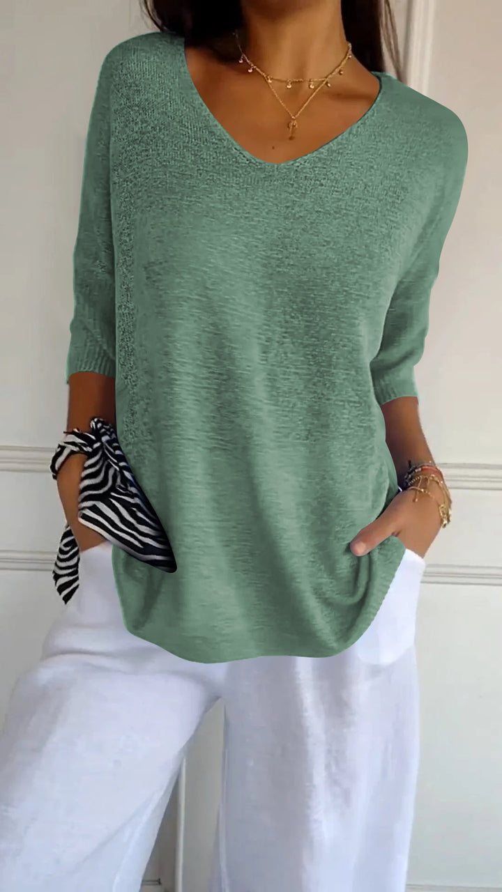Everyday fashion: Women's V-neck knit top with long sleeves, offering effortless style & comfort.