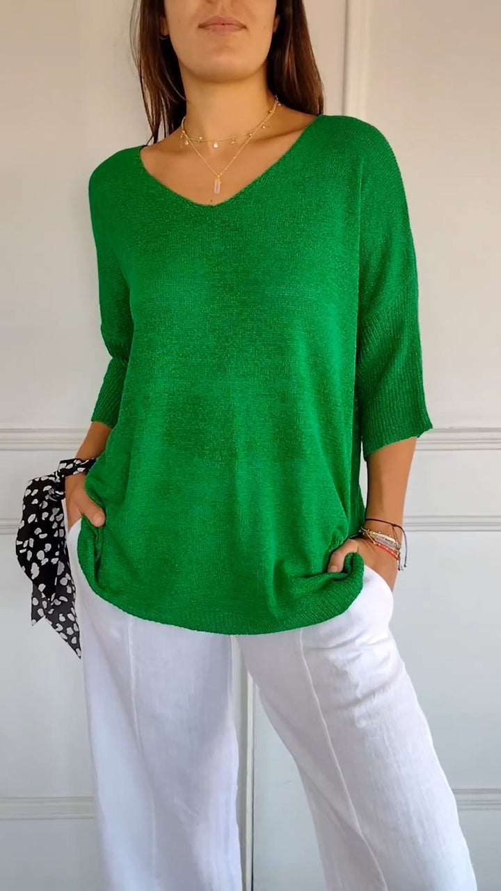 Women's V-neck knit top, an elegant long sleeve shirt for versatile everyday fashion.