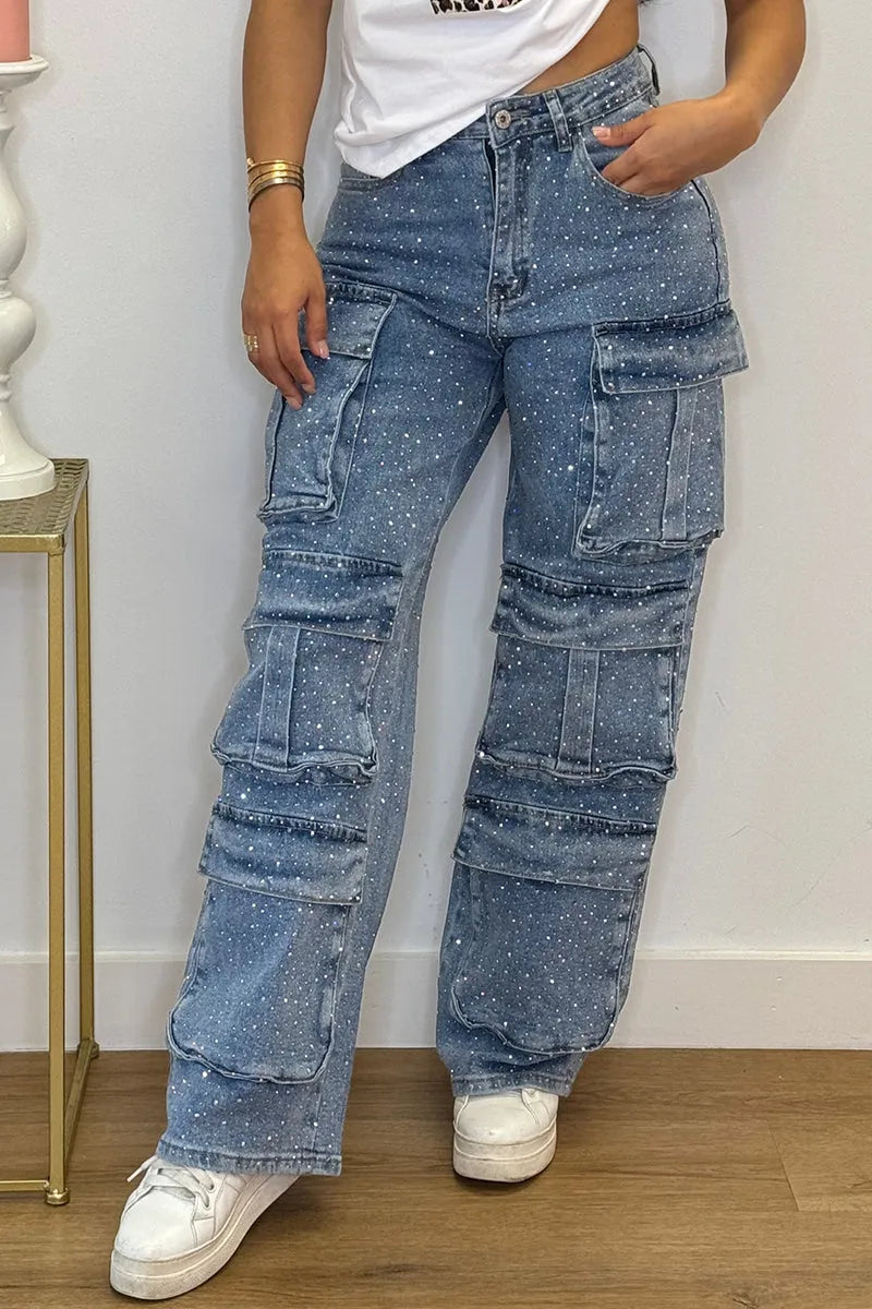 Durable denim women's cargo pants, adorned with sparkling rhinestones for a stylish, embellished fashion look.