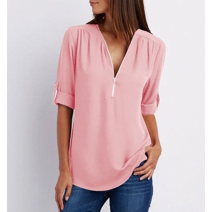 Women's Sophie V-neck blouse with a stylish zip, featuring comfortable 3/4 sleeves and a relaxed fit for casual wear.