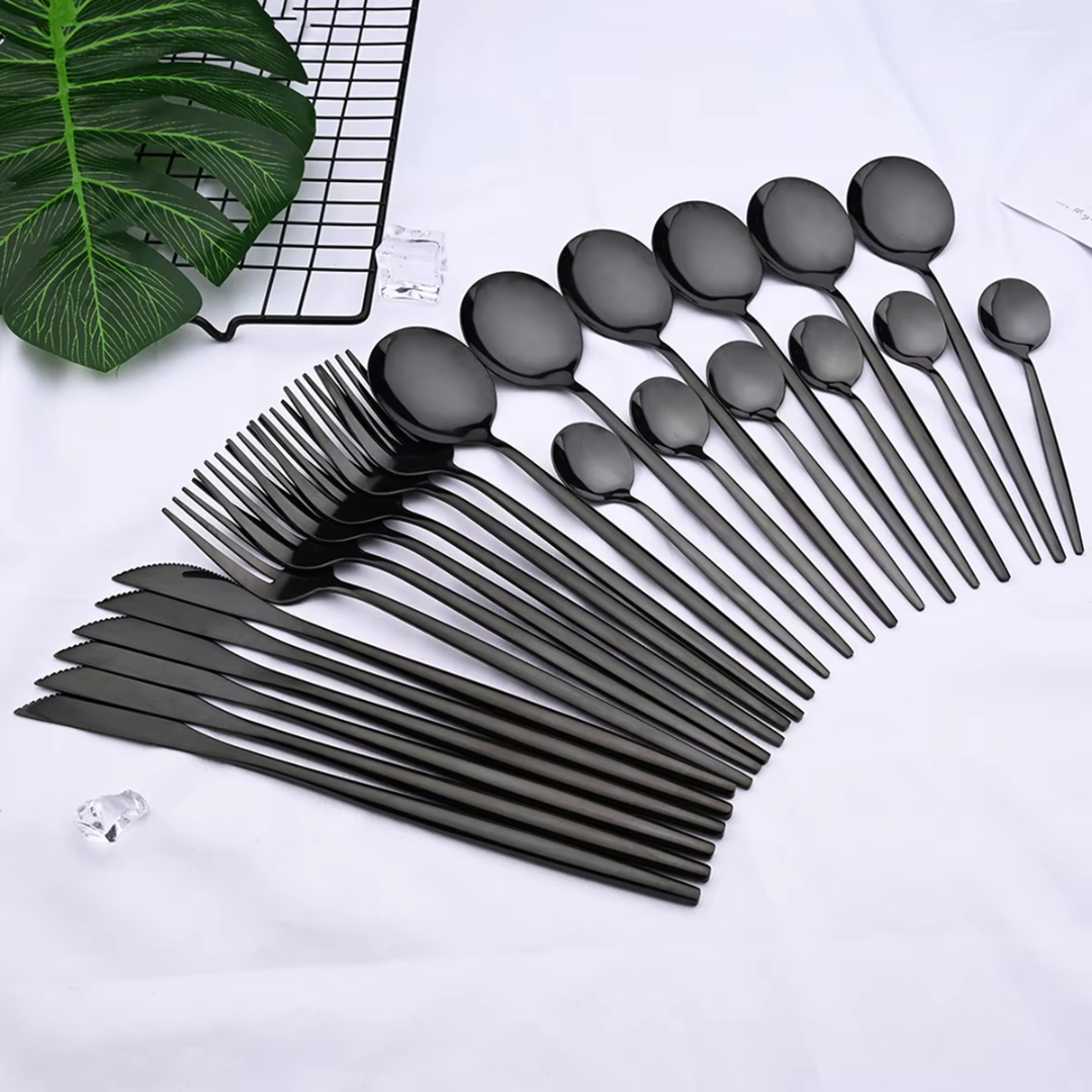 Stylish 24-piece black stainless steel cutlery set, essential kitchenware for a chic home dining experience.