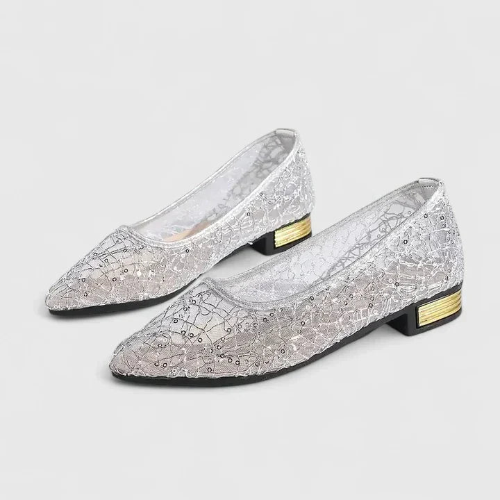 Stylish gold women's flats with a pointed toe and striking gold heel detail, perfect for elegant formal occasions.