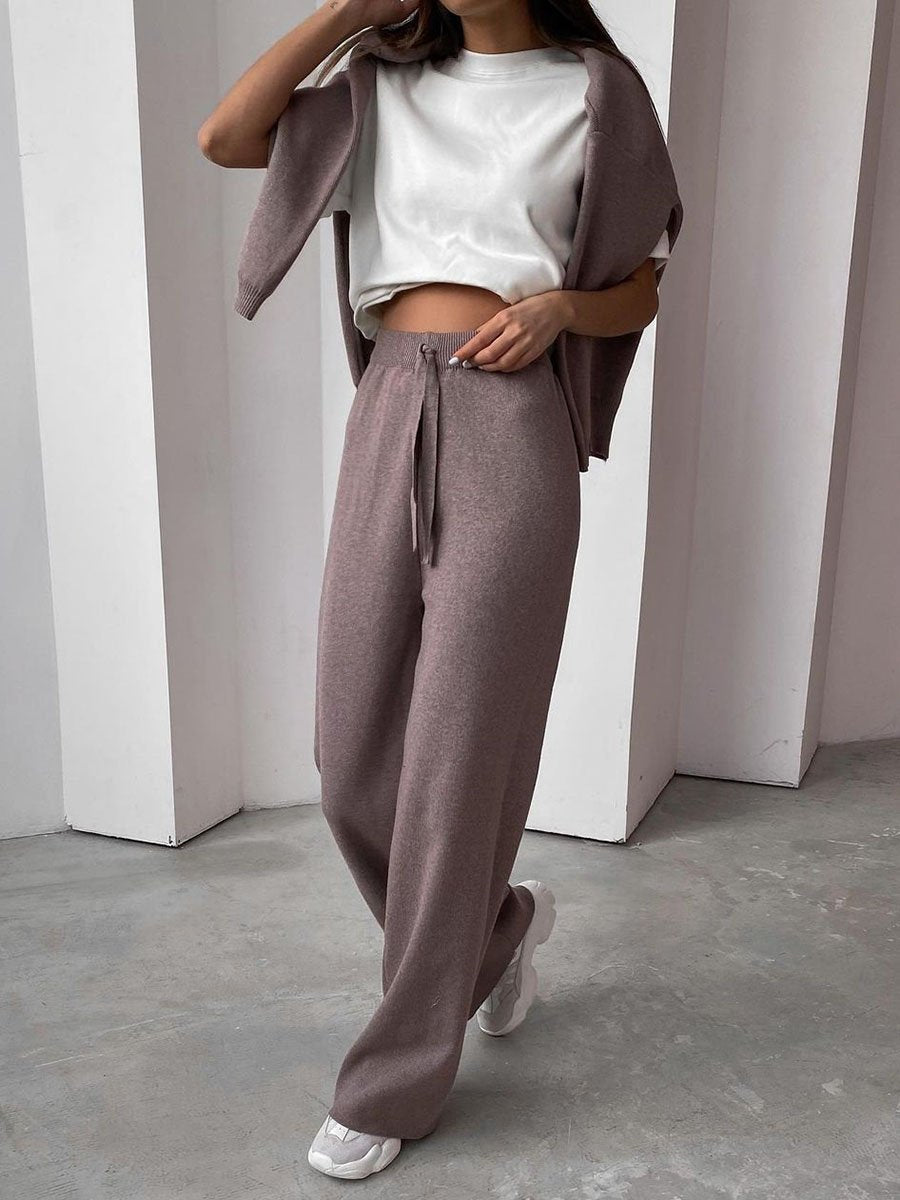 Model wearing a women's cozy two-piece loungewear set, perfect for stylish comfort at home.