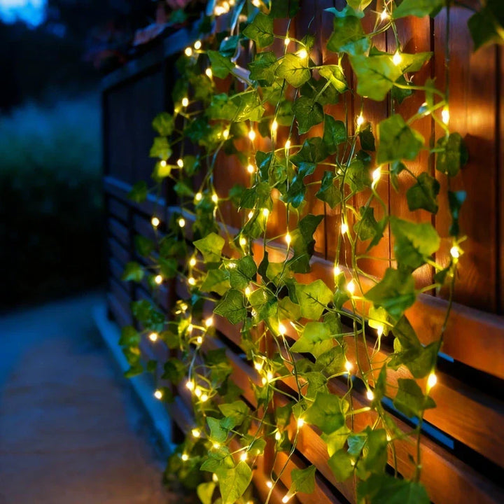 Long LED leaf vine lights, warm white, perfect for draping & creating a charming illuminated display.