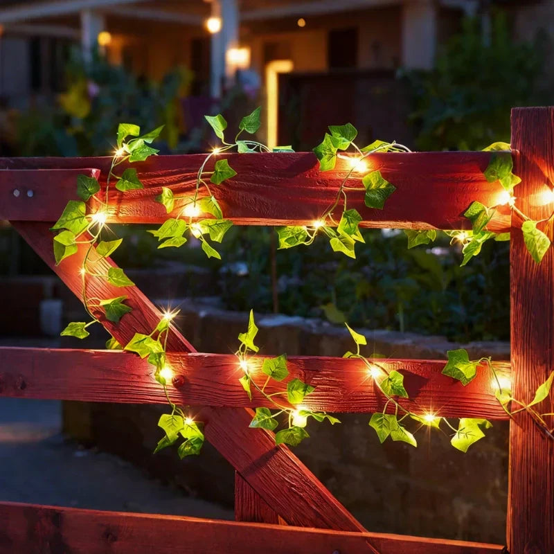 Ambient warm white LED leaf garland lights for cozy indoor spaces & enchanting outdoor evenings.
