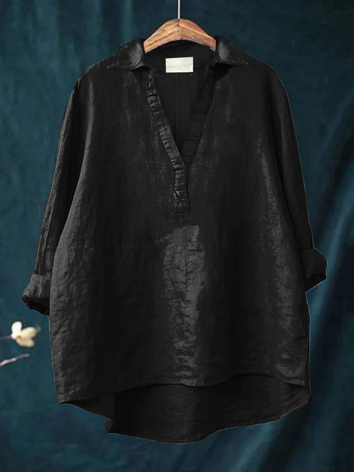 Timeless women's versatile shirt, a long-sleeve button-down blouse delivering effortless elegance & comfort.