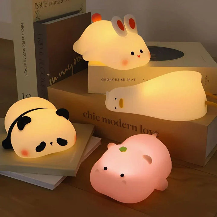 Soft silicone animal night light with tap control, dimmable LED for kids' rooms & nursery.