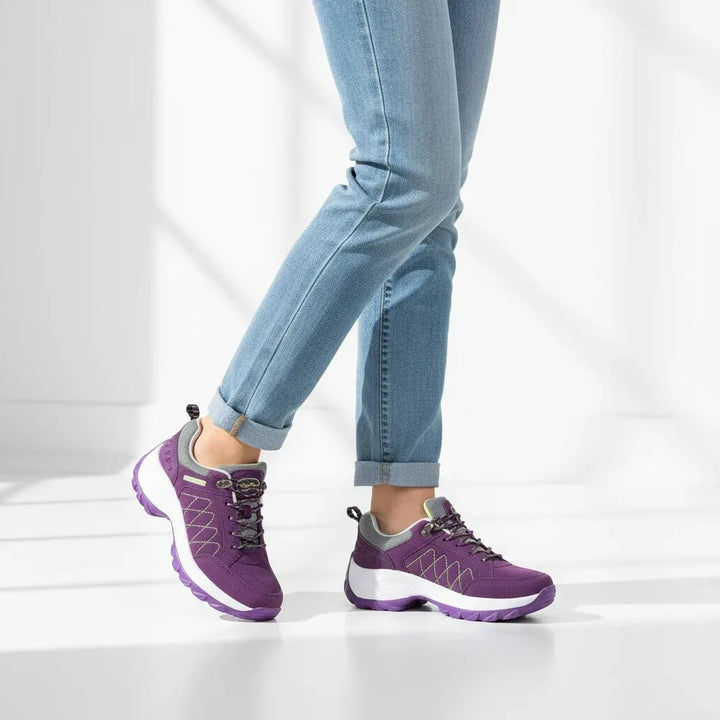 Stylish purple & magenta women's sneakers with premium arch support & breathability.