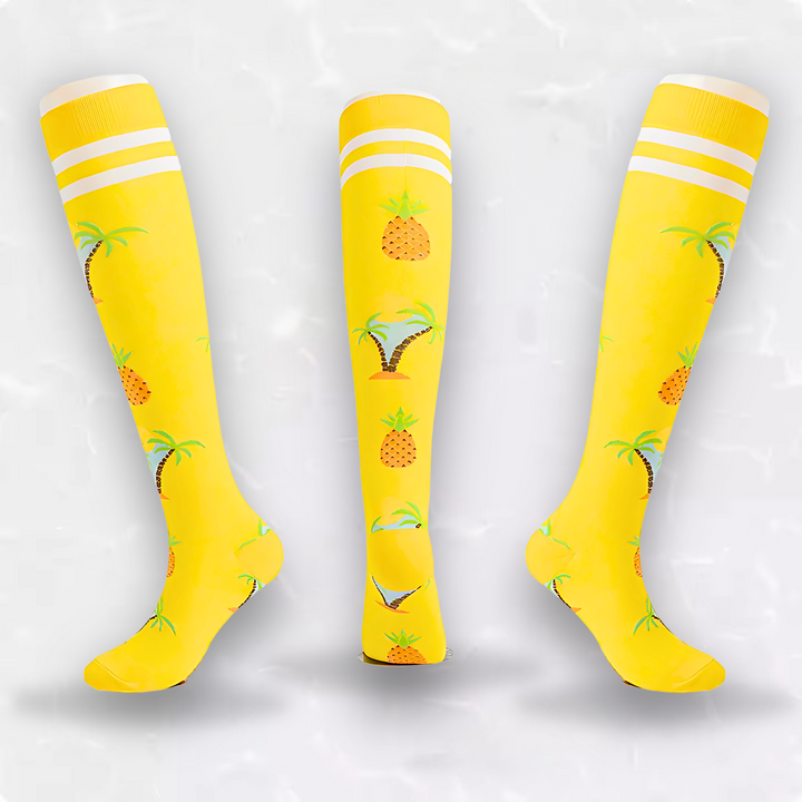 Colorful unisex compression socks with a playful fruit pattern, offering leg support & travel comfort.