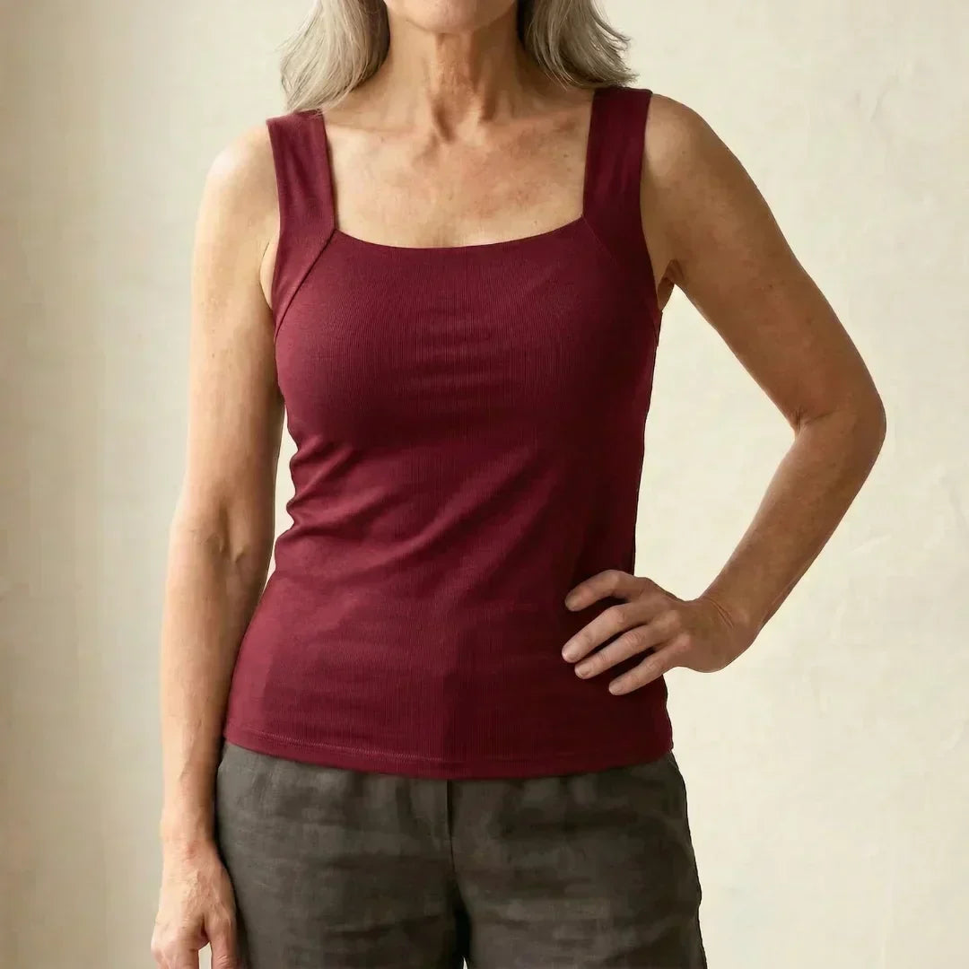 Stylish & practical women's built-in bra tank top, offering seamless support & comfort.