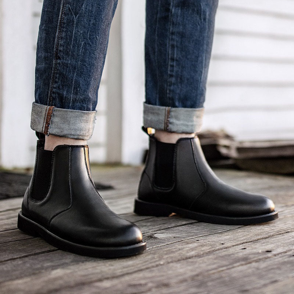 Men's slip-on Chelsea boots with steel toe, offering safety, comfort, and versatile style.