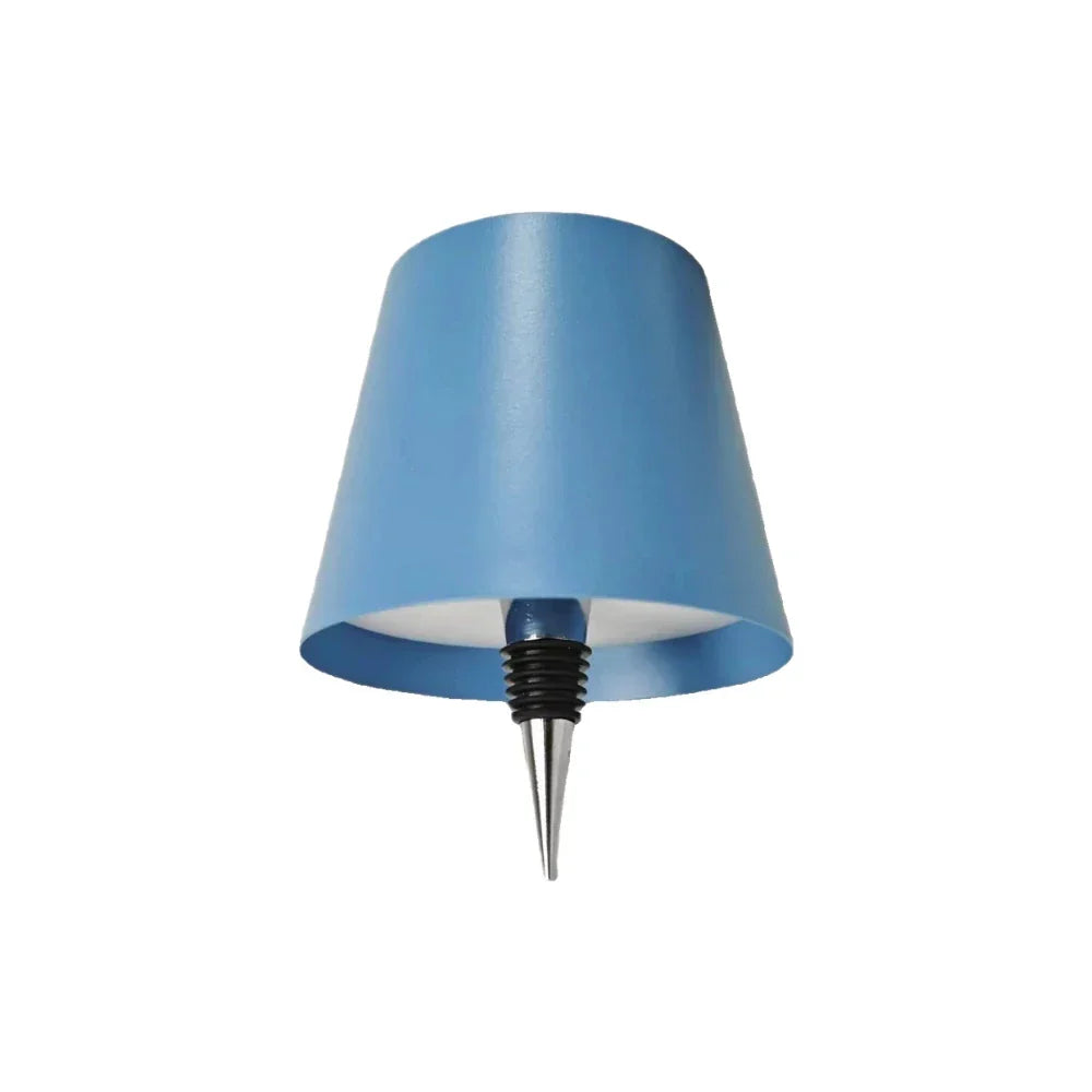 Cordless rechargeable LED lamp cap, ideal for adding ambient light to any glass bottle collection.