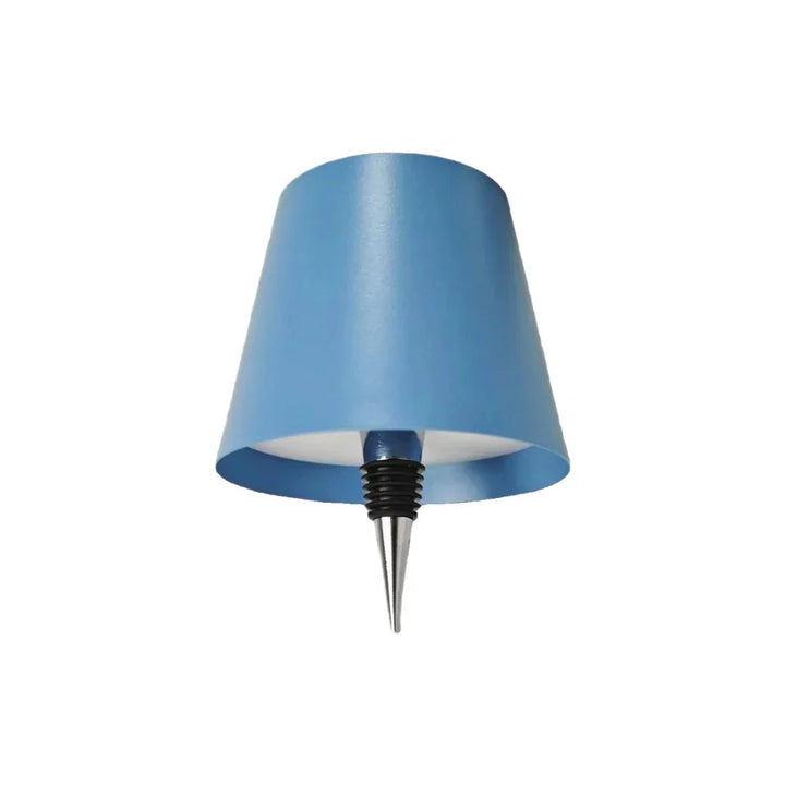 Cordless rechargeable LED lamp cap, ideal for adding ambient light to any glass bottle collection.
