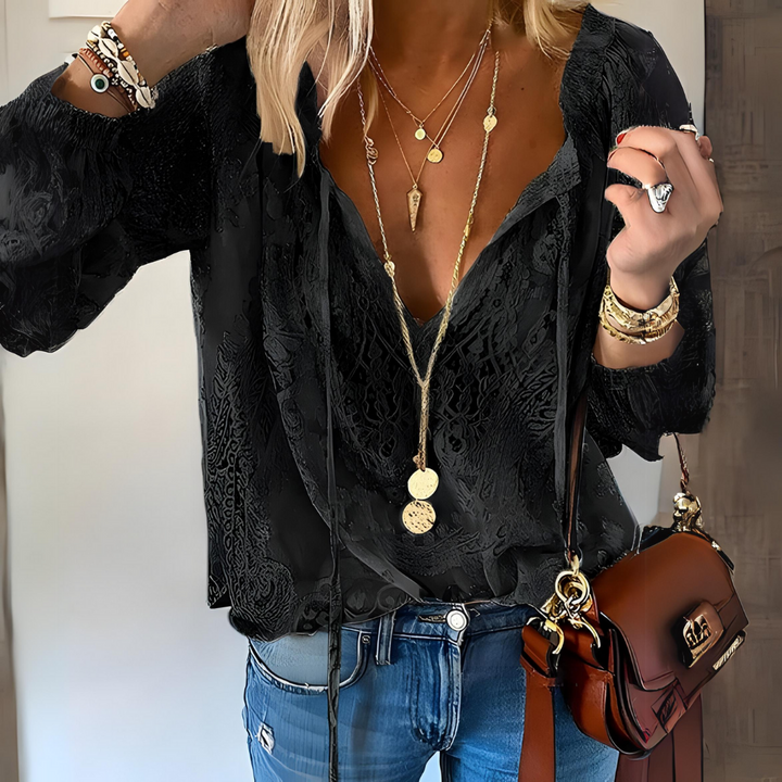 Light and airy women's boho lace V-neck blouse, relaxed fit for ultimate summer comfort. Elegant casual feminine top.
