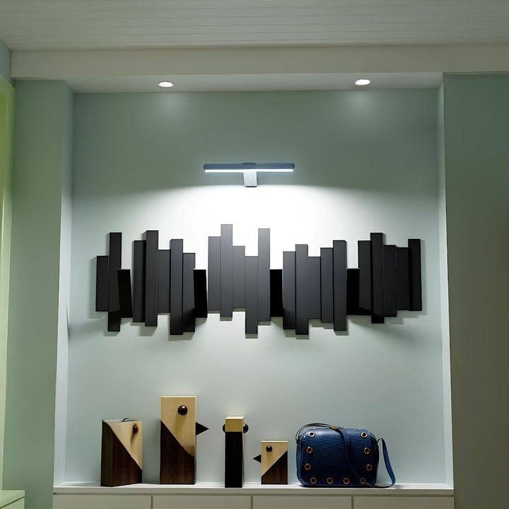 Easy-install cordless LED art light. Dimmable, rechargeable with remote for home gallery lighting.