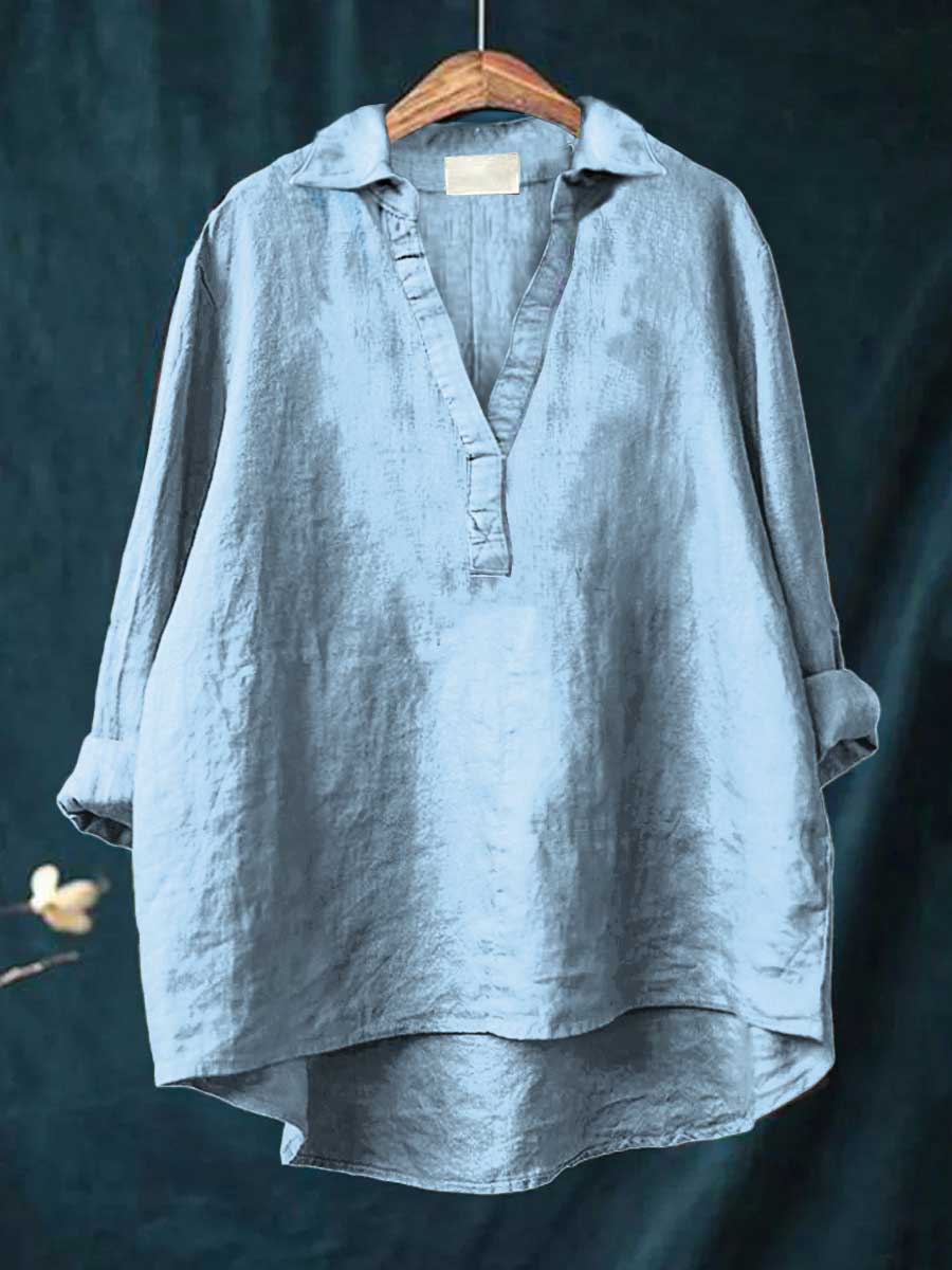Versatile women's elegant top, long-sleeve button-down blouse suitable for office wear & everyday fashion.