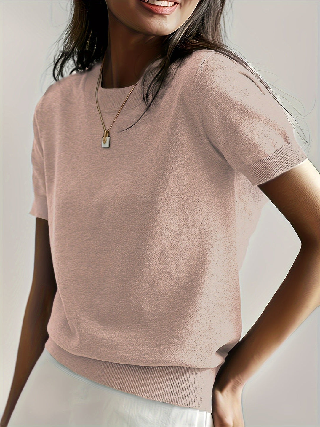 Relaxed fit women's casual t-shirt, featuring a round neck, great for effortless daily wear.