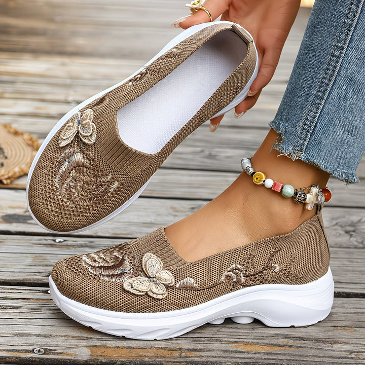 Supportive women's knit slip-on walking trainers, designed for lasting comfort & daily wear.