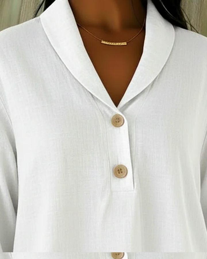 Versatile women's V-neck 3/4-sleeve top, great for work, casual outings, or elegant everyday wear. Spring/summer fashion.