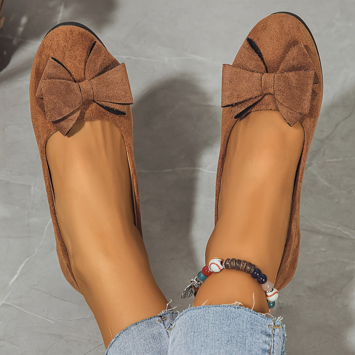 Black comfortable wedge ballet flats, women's slip-on footwear with stylish bow detail & round toe.