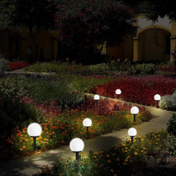 SunLuxe 3-piece waterproof solar LED orbs for elegant garden, patio, or pathway illumination.