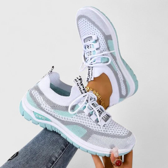 Stylish women's sports casual trainers with a distinctive chunky sole and multi-color block details.