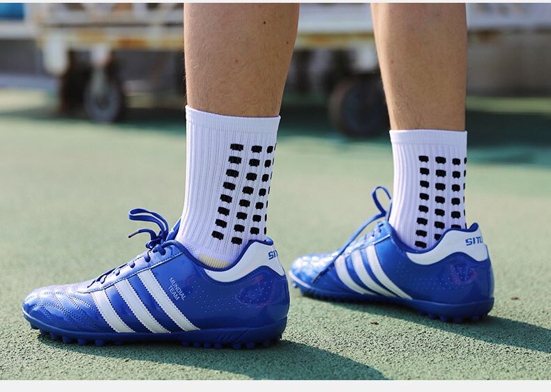 Unisex mid-calf traction socks. Anti-slip design for secure footing during various sports activities.