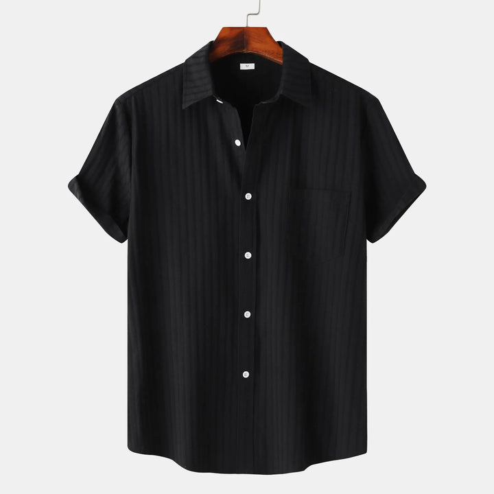 Highly versatile men's short sleeve button-down shirt. Perfect for spring, summer, casual, or office settings.