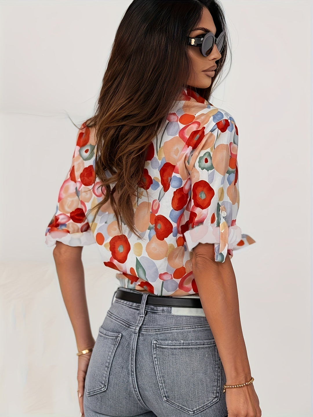 Soft women's long sleeve floral print button-up top with elegant design, ideal for spring/summer fashion.
