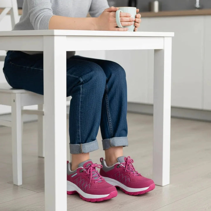 Breathable magenta women's walking shoes, designed for comfort & arch support.