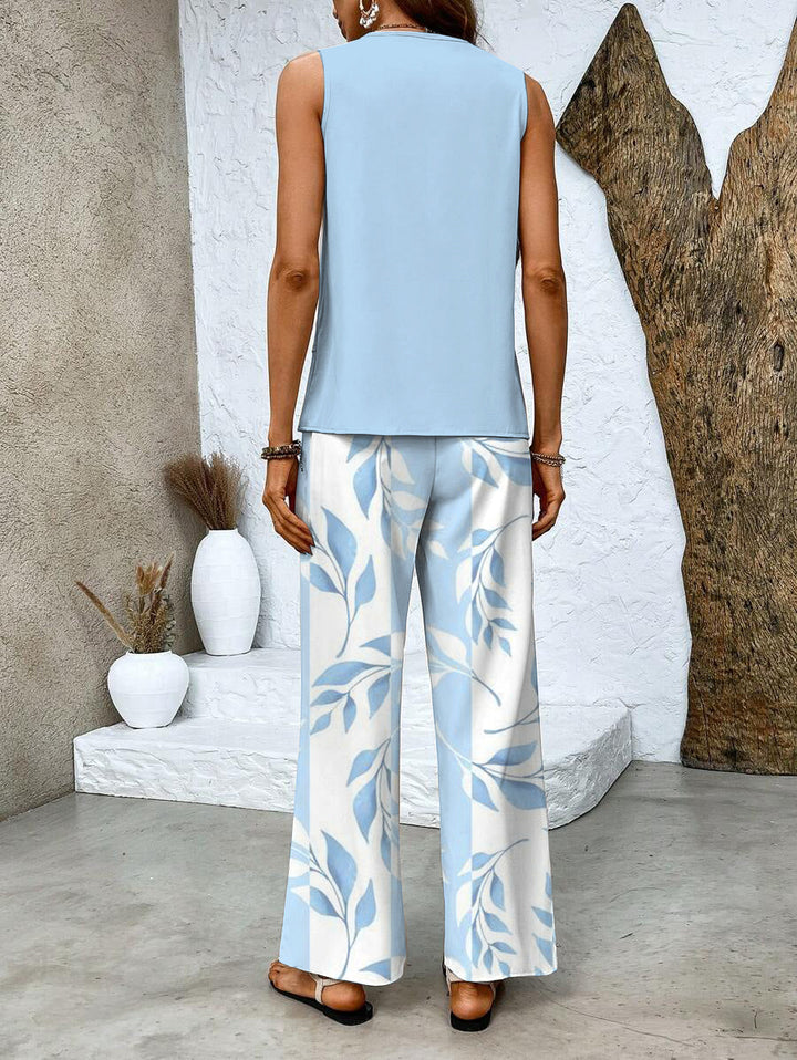 Casual women's two-piece summer set featuring a sleeveless top and comfortable wide-leg pants in cotton blend.