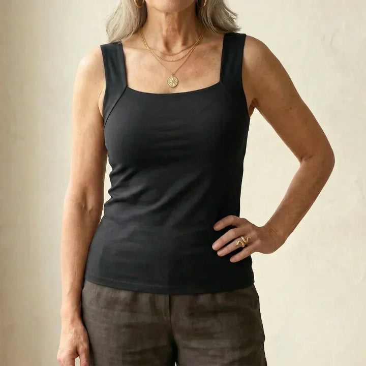 Convenient women's tank top with built-in bra, ideal for effortless style & easy wear.