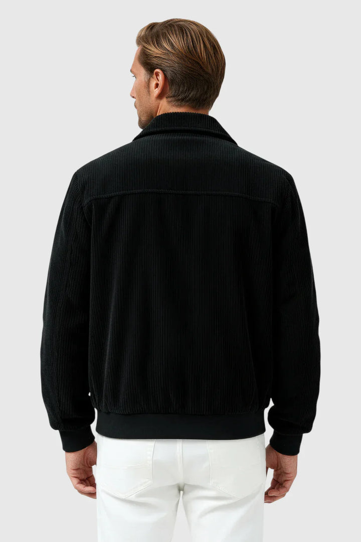 Casual black corduroy jacket for men, featuring buttons & a relaxed fit, ideal for stylish fall fashion.