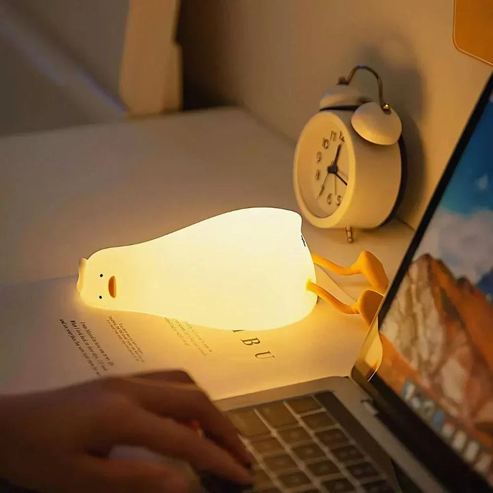 BPA-free soft silicone animal night light, safe nursery decor. Portable & dimmable LED.