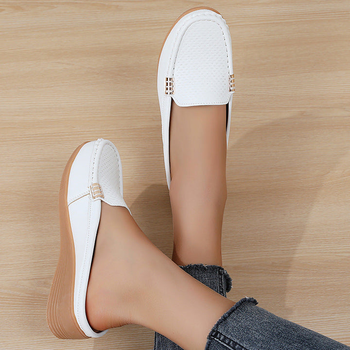 Spring women's slip-on wedge mules, offering comfort and versatile everyday style.
