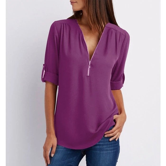 Stylish women's zip V-neck blouse with 3/4 sleeves, designed for a comfortable relaxed fit and everyday wear.