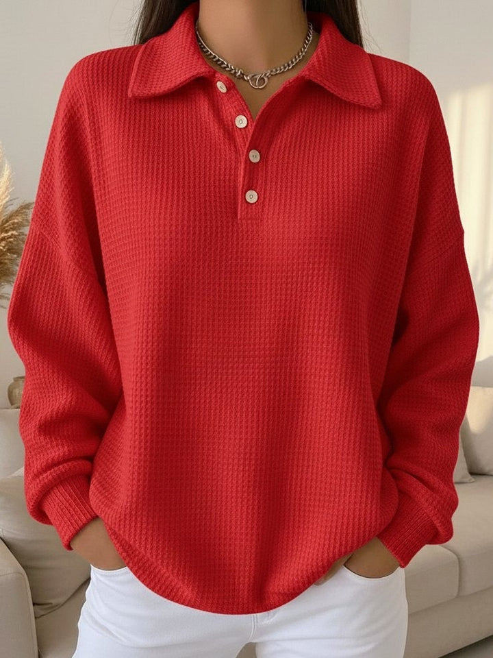 Women's relaxed waffle knit polo shirt, long sleeve. Cozy casual top for comfortable everyday wear.