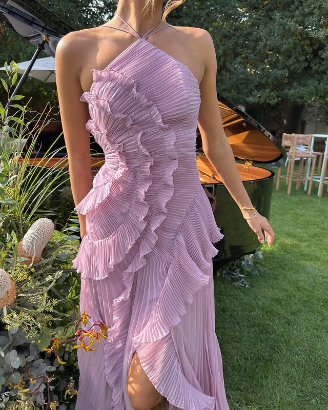Beautiful women's ruffle maxi dress designed for special occasions, offering a graceful and elegant look.