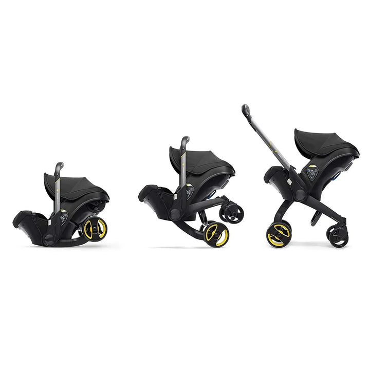 Stylish black 4-in-1 baby stroller and car seat travel system, essential for new parents.