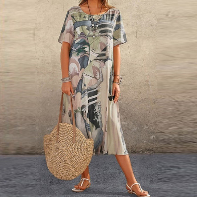 Effortlessly stylish women's relaxed fit midi dress with a vibrant print and comfortable design for everyday wear.