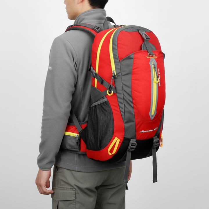 Side view of 40L unisex water resistant hiking & travel backpack with side pockets & compression straps.