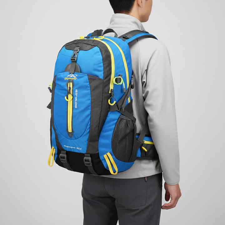 Ergonomic back panel, padded shoulder straps & hip belt of a 40L unisex outdoor travel backpack.
