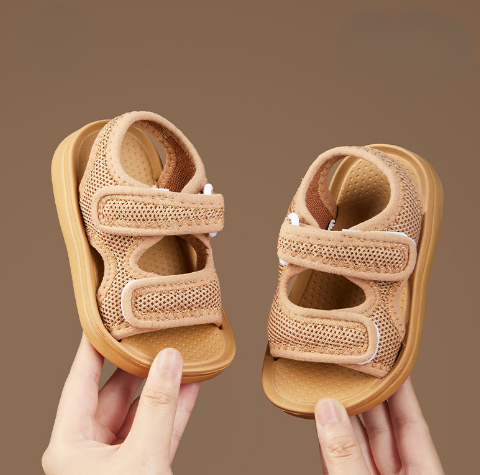 Durable children's summer sandals with quick-fastening, breathable upper, & soft sole for all-day comfort.
