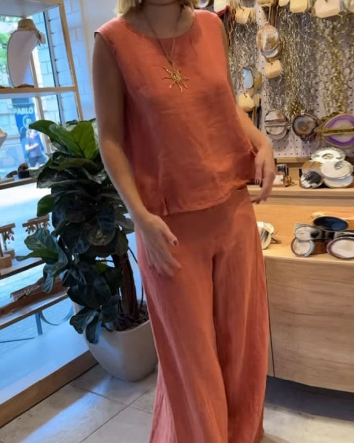 Comfortable women's 2-piece co-ord set with relaxed fit sleeveless top & wide leg trousers for vacation.