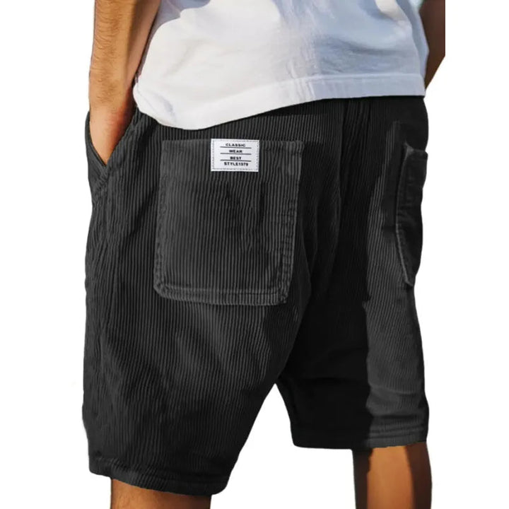 Modern men's fashion tailored shorts with a unique texture, offering a contemporary smart casual appeal.